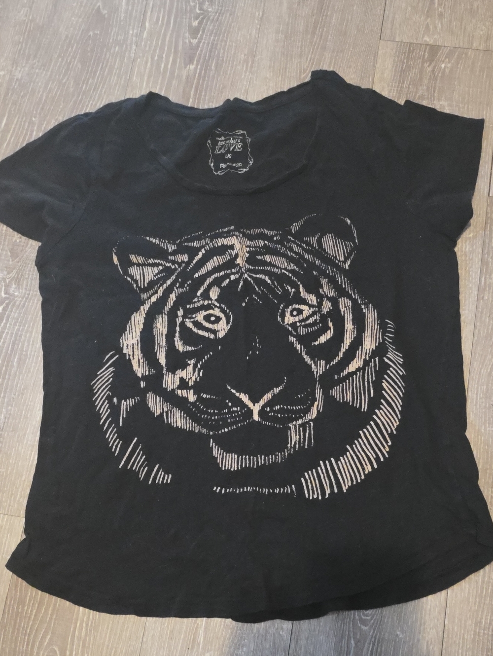 Revolution Black Tee with Beige Tiger Face Graphic